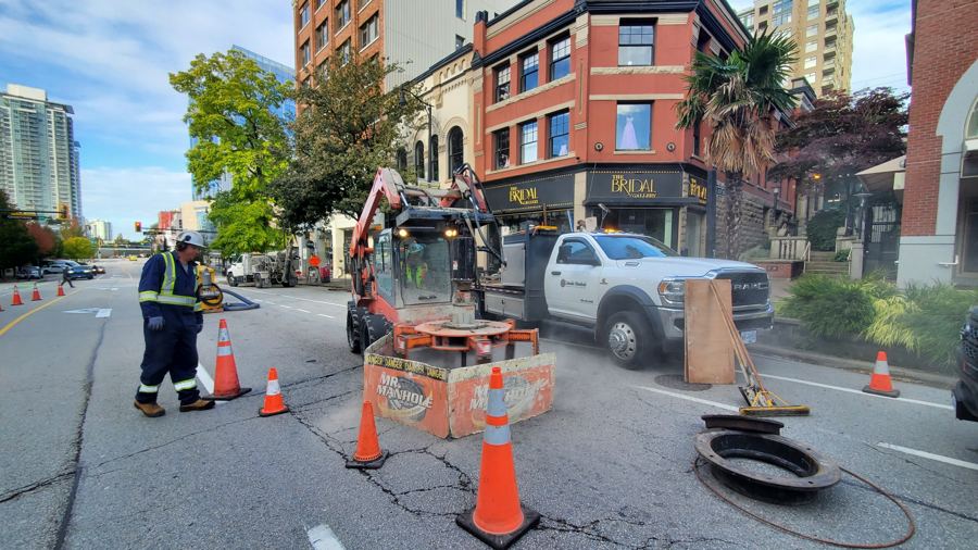 Crew and equipment set up on Columbia St